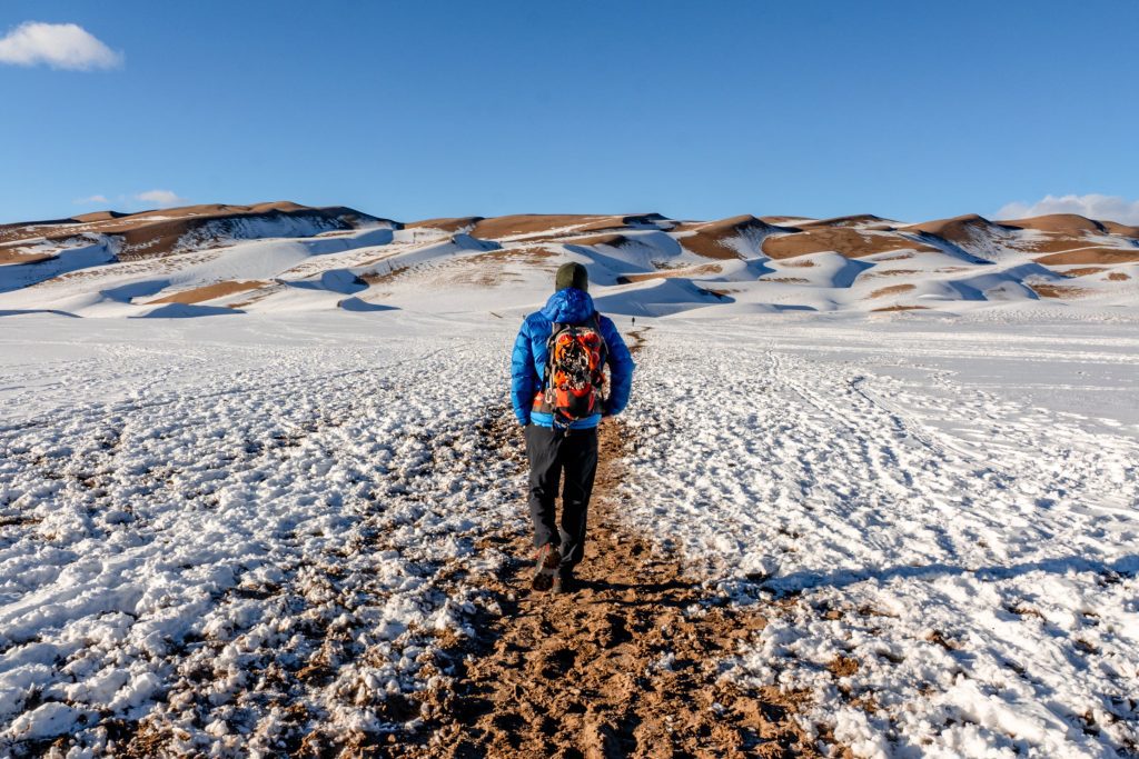 Hiker in Great Sand Dunes National Park Hikes on Dune Field